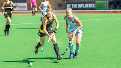 Girls playing field hockey, albany wa